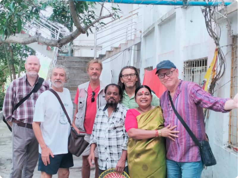 Happy retreat participants at Kriya Yoga Wellness, Gangasagar, sharing joyful moments after a spiritual retreat experience
