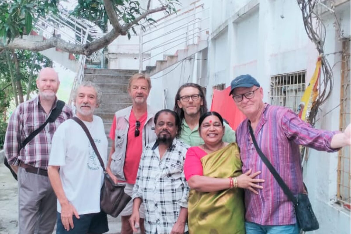 Happy retreat participants at Kriya Yoga Wellness, Gangasagar, sharing joyful moments after a spiritual retreat experience